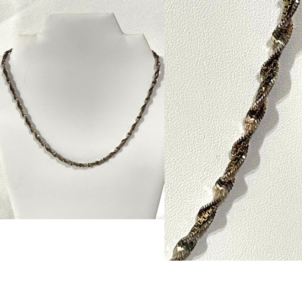 Sterling silver two-tone rope chain necklace.